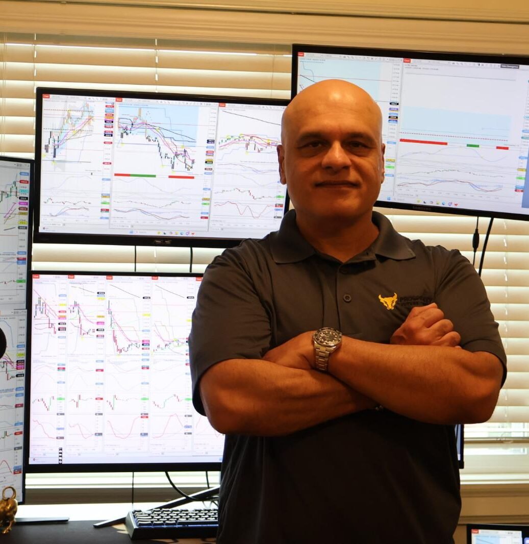 A picture of Ali Khataw trading stocks.